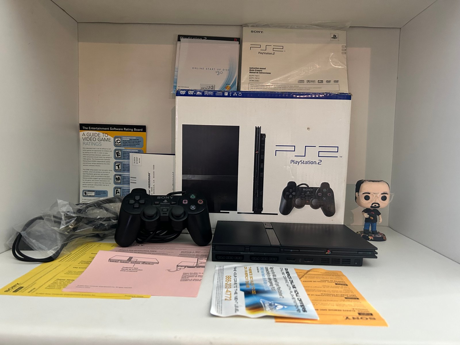 PlayStation 2 Slim CIB Bloqueado.
